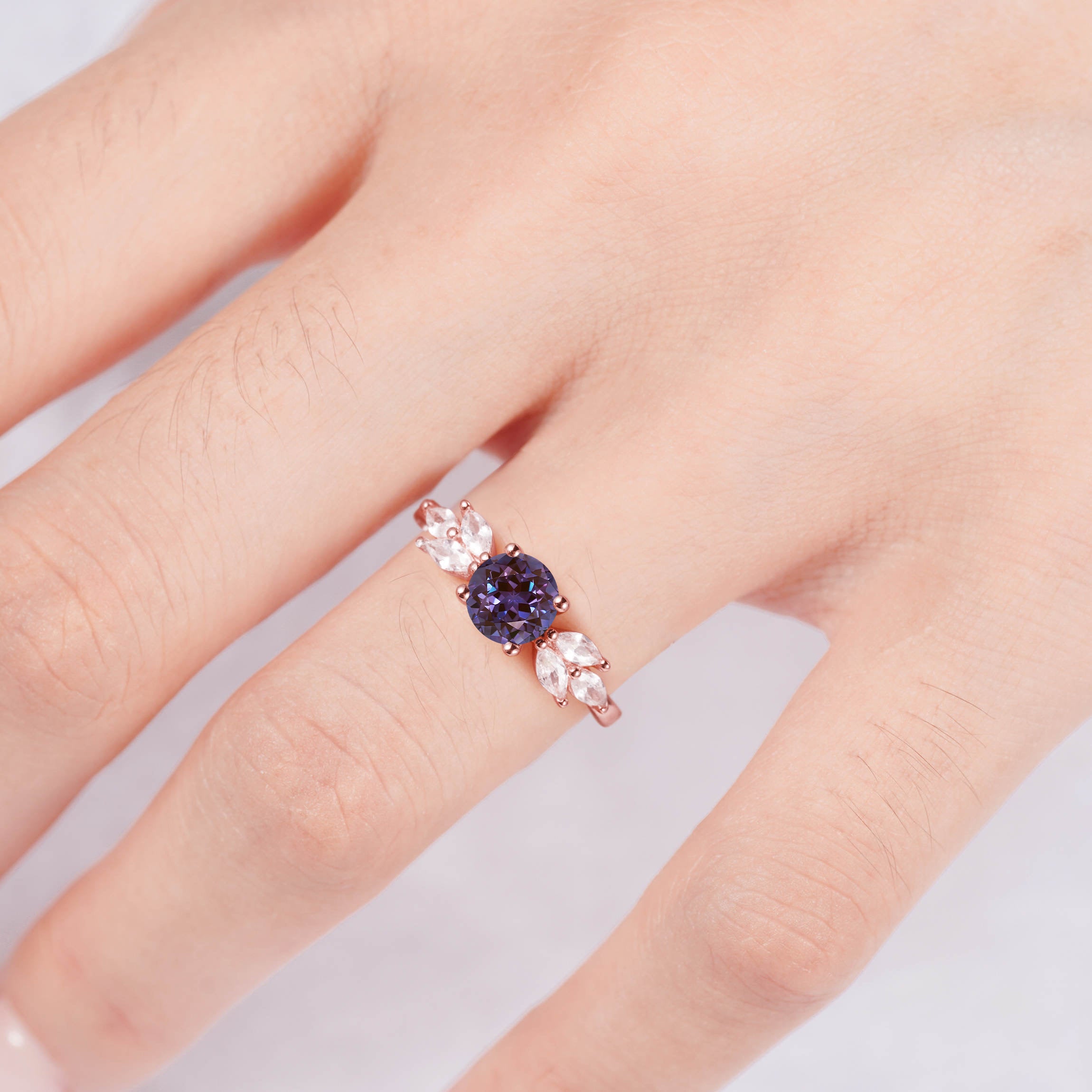 Handcrafted rose gold alexandrite ring with crystals