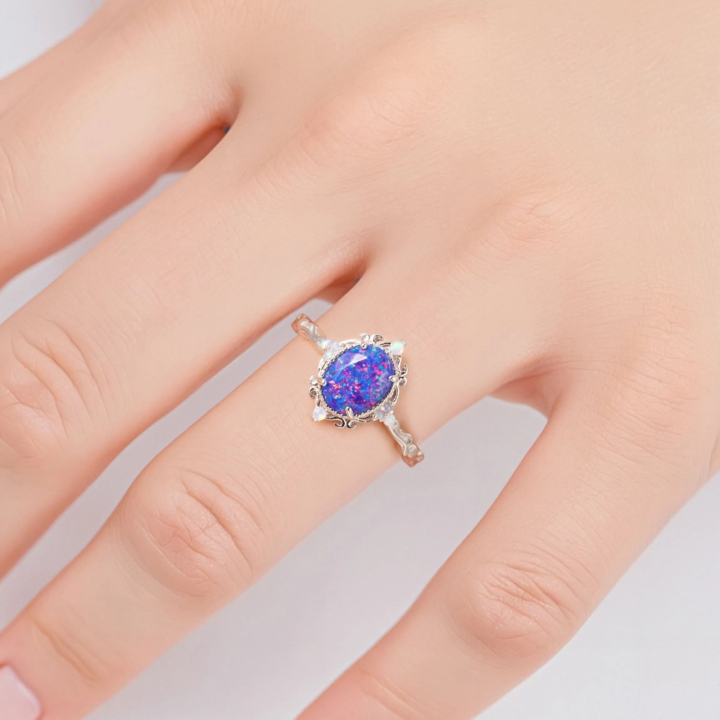 Keri fire opal ring with blue and white opals