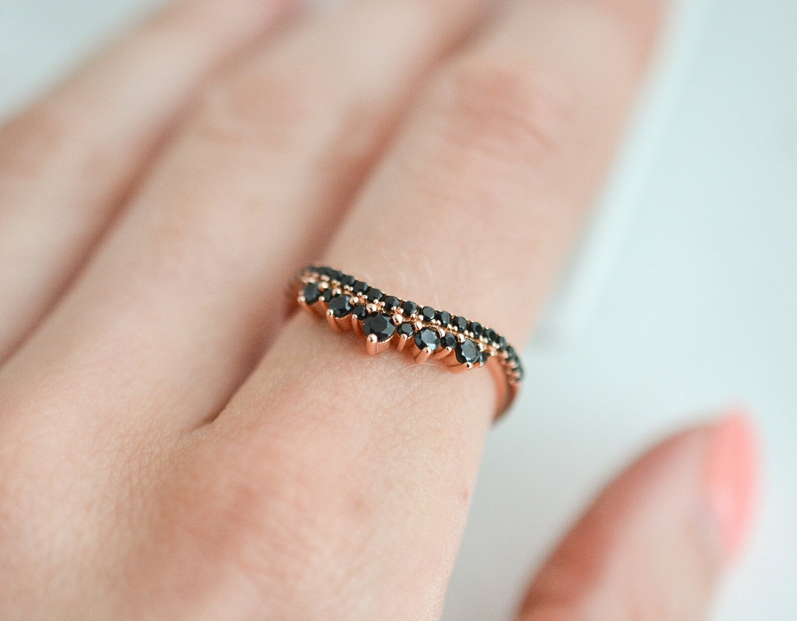 Black Onyx Ring in Rose Gold with Curved Crown Design