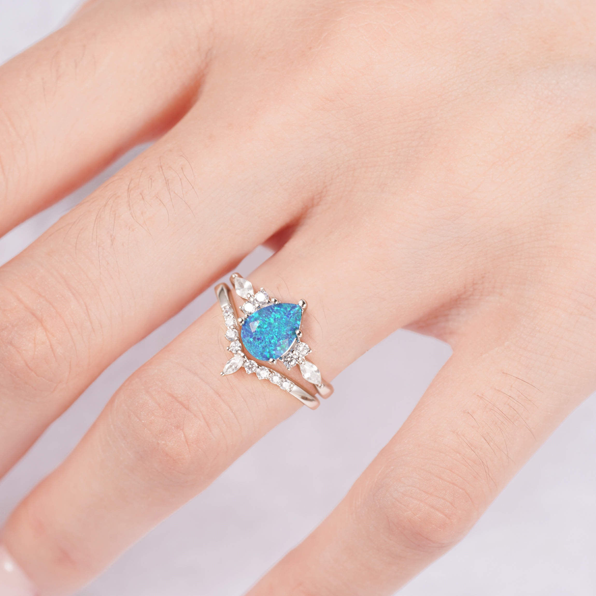 Teal fire opal ring with sterling silver band and crystals