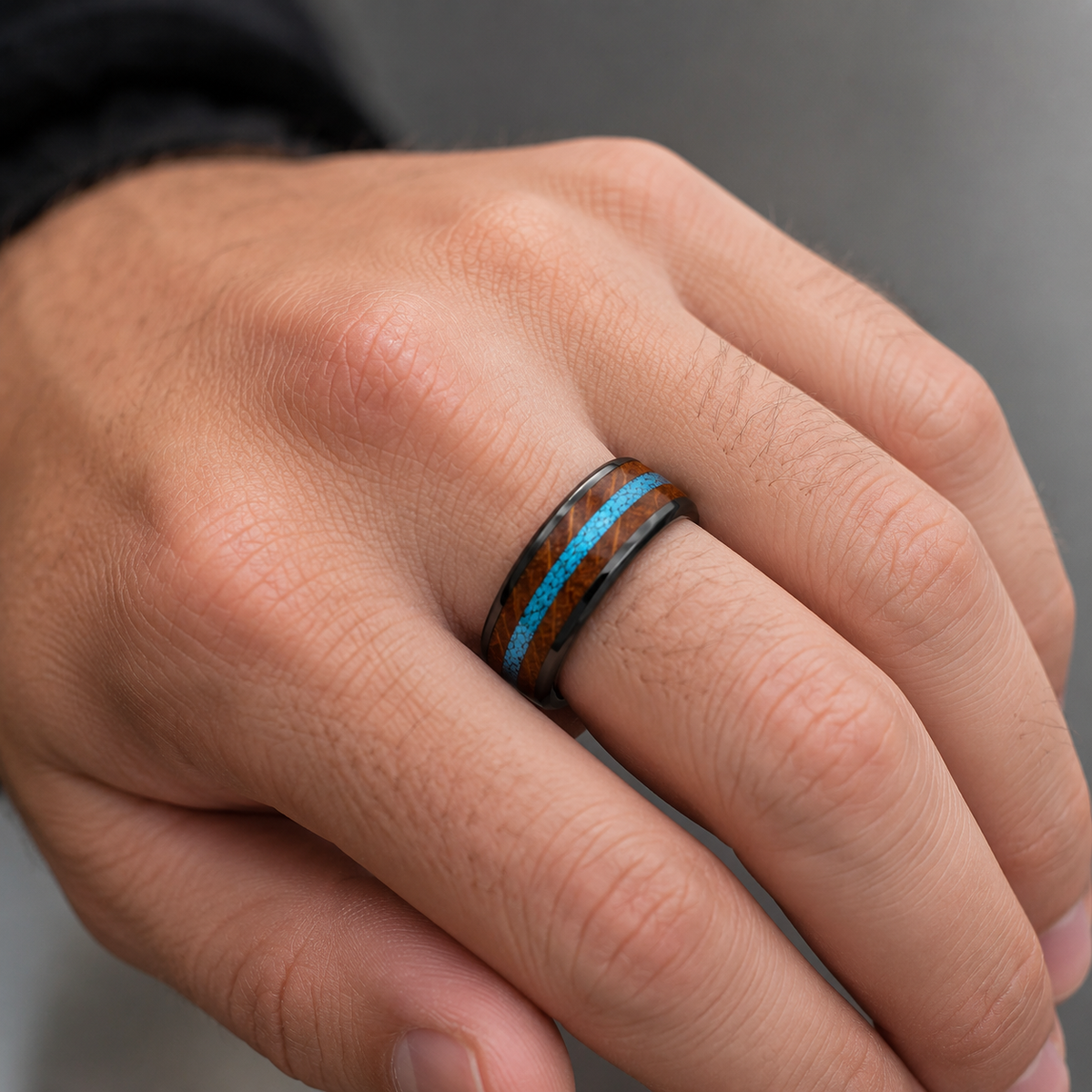 Whiskey barrel wood and turquoise men's ring worn on hand