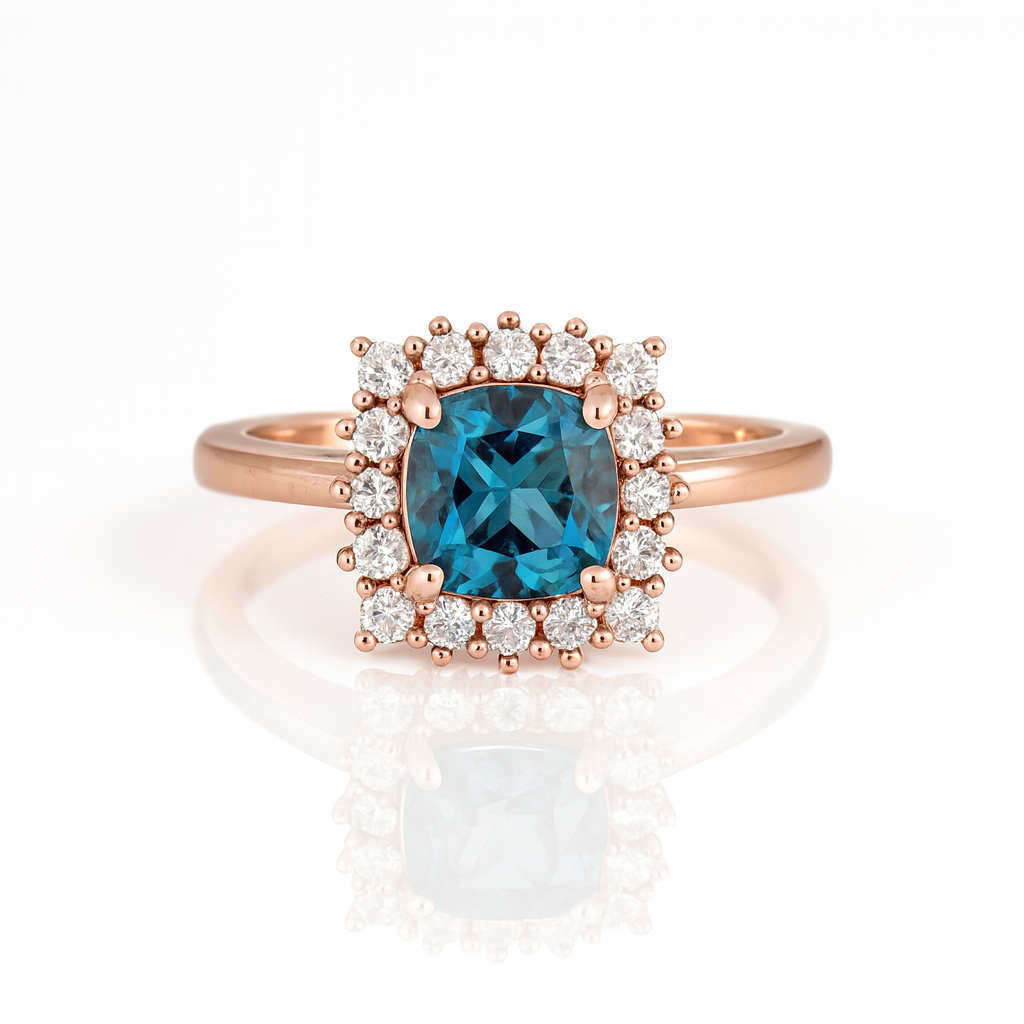 Close view of a Kherish gemstone ring showing the center stone and surrounding setting