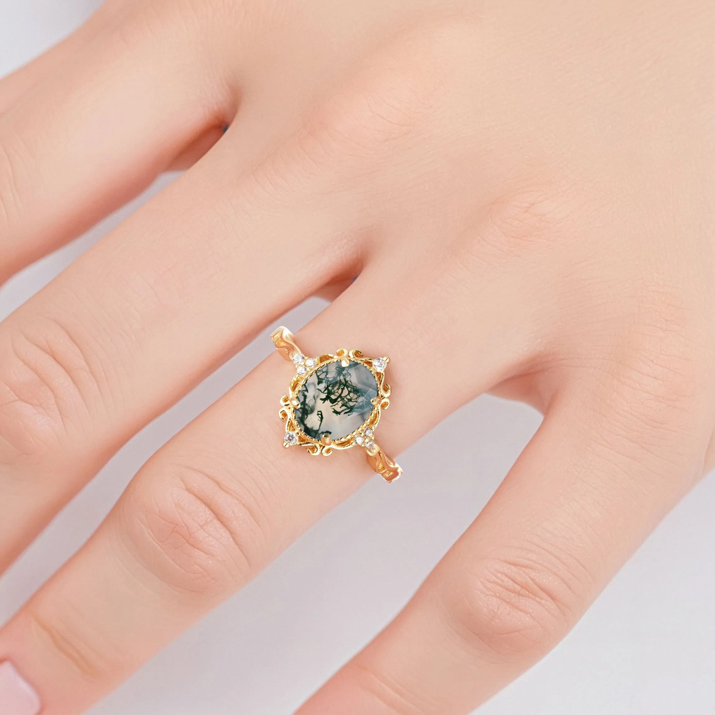 Moss agate ring with natural patterns and crystal accents