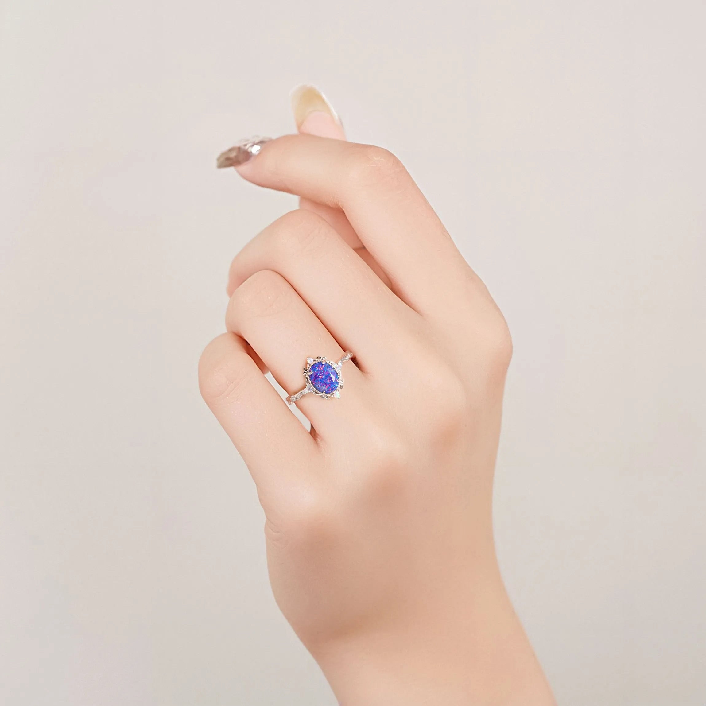 Keri fire opal ring with blue and white opals