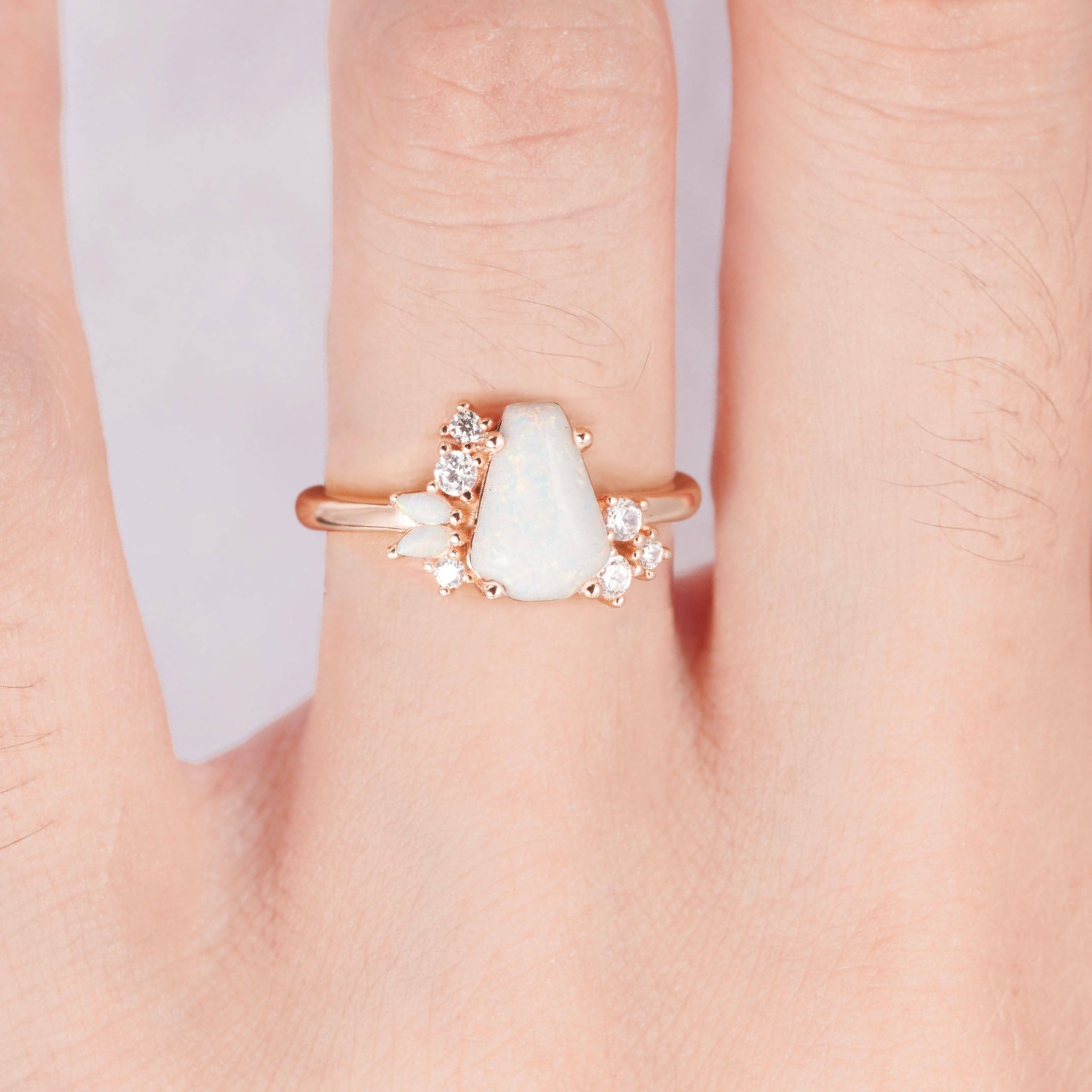 Coffin-cut opal ring in rose gold with moissanite accents