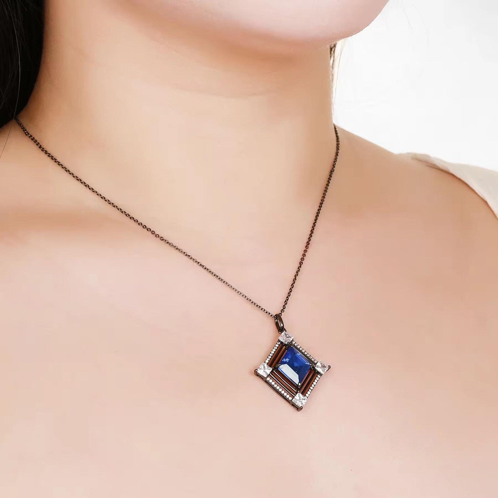 Fria Sapphire and Black Gold Necklace