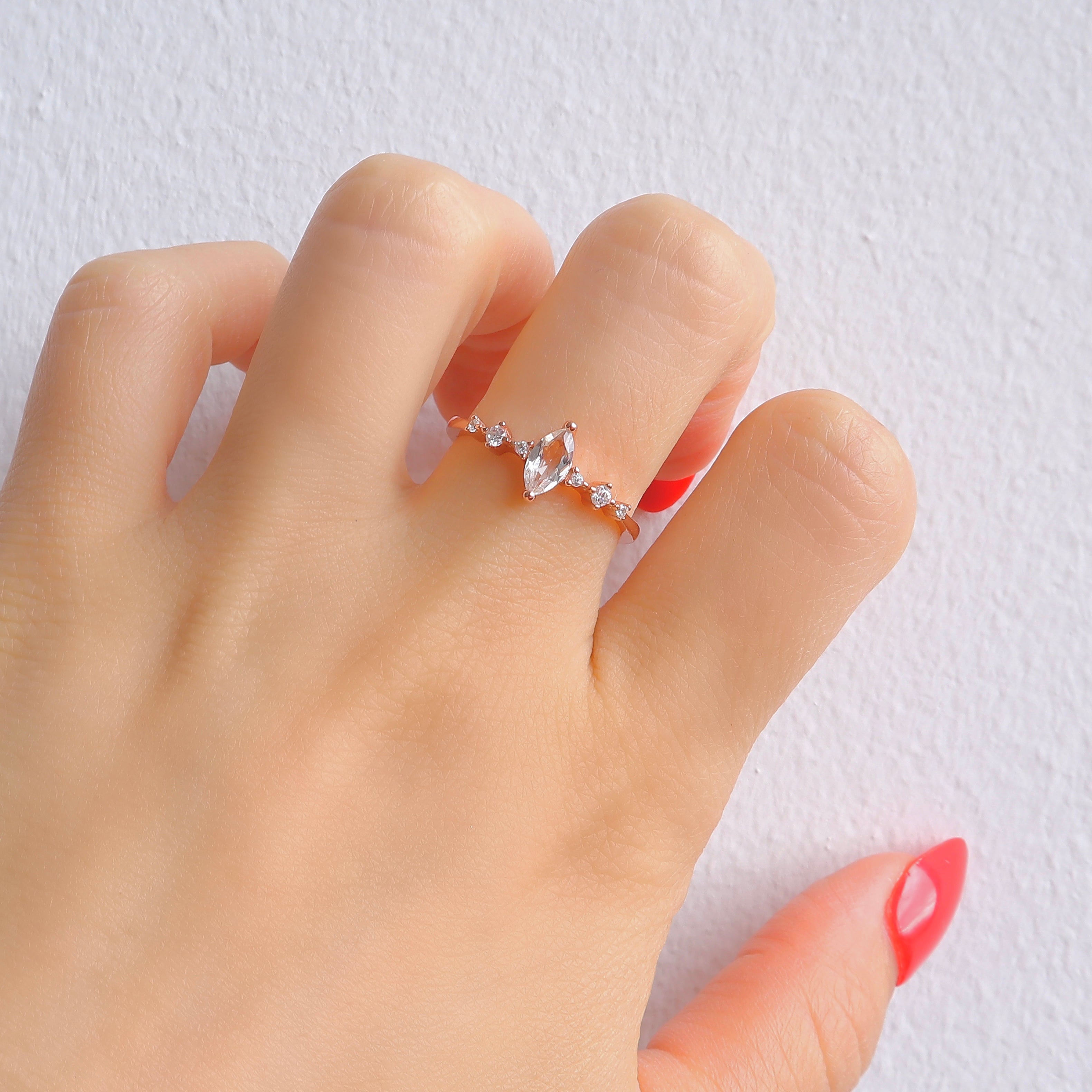 Rose gold crystal ring with marquise-cut gemstone