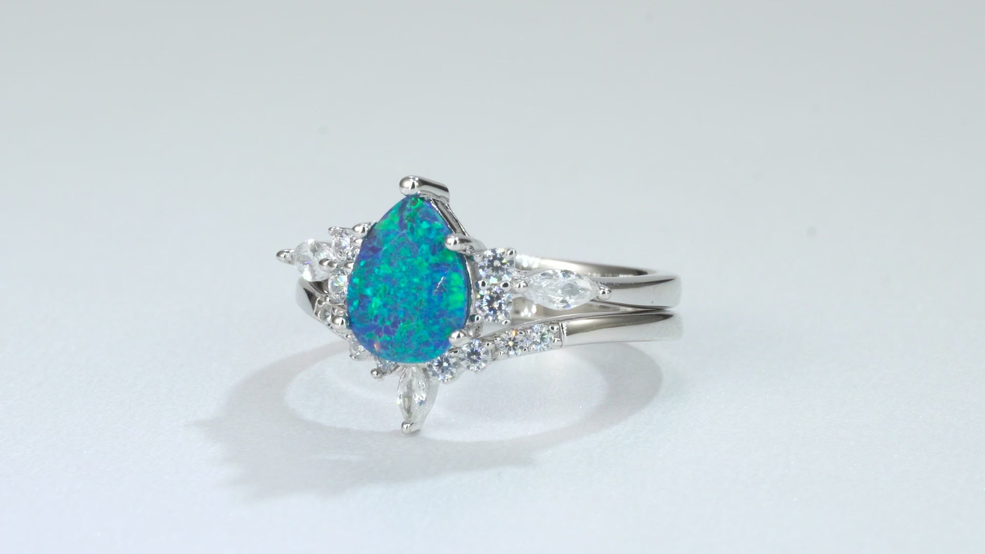 Teal fire opal ring with sterling silver band and crystals