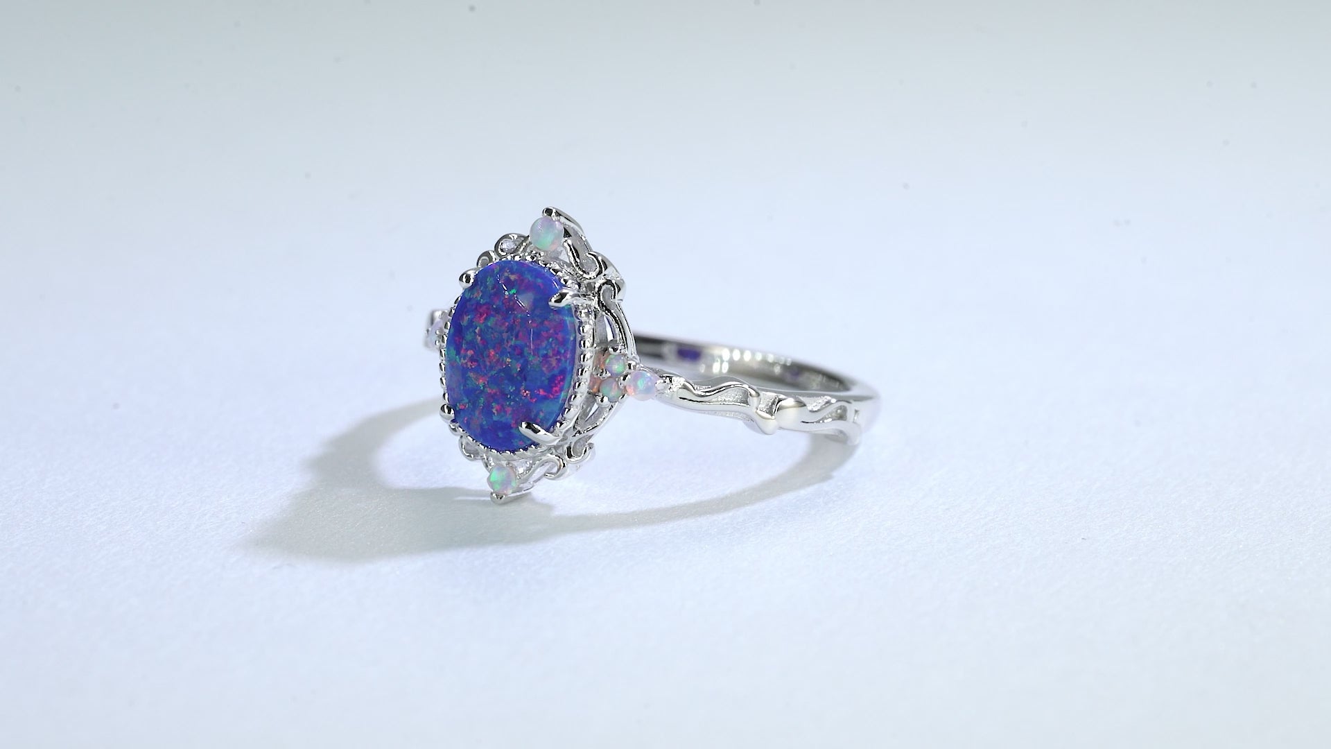 Keri fire opal ring with blue and white opals