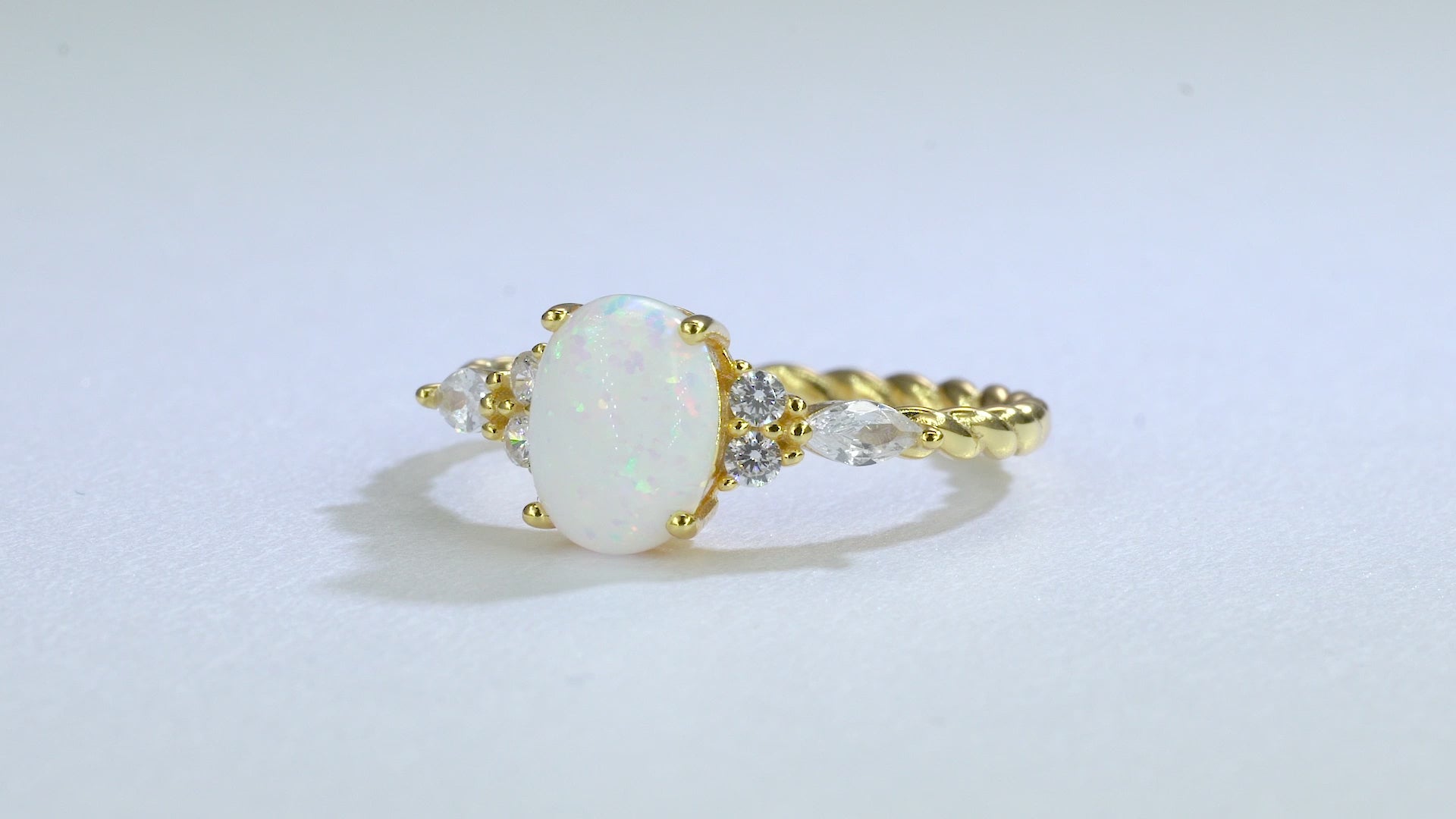 Gold Opal Ring with color-changing opal and crystal accents
