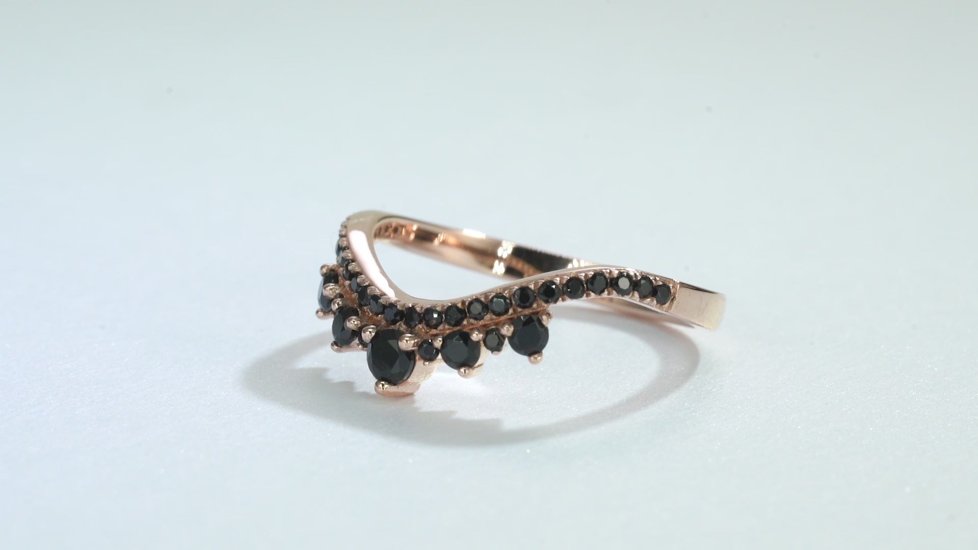 Black Onyx Ring in Rose Gold with Curved Crown Design