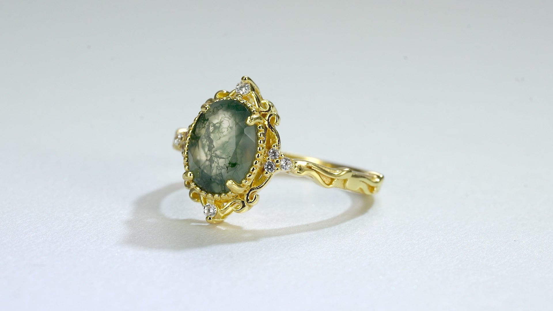 Moss agate ring with natural patterns and crystal accents