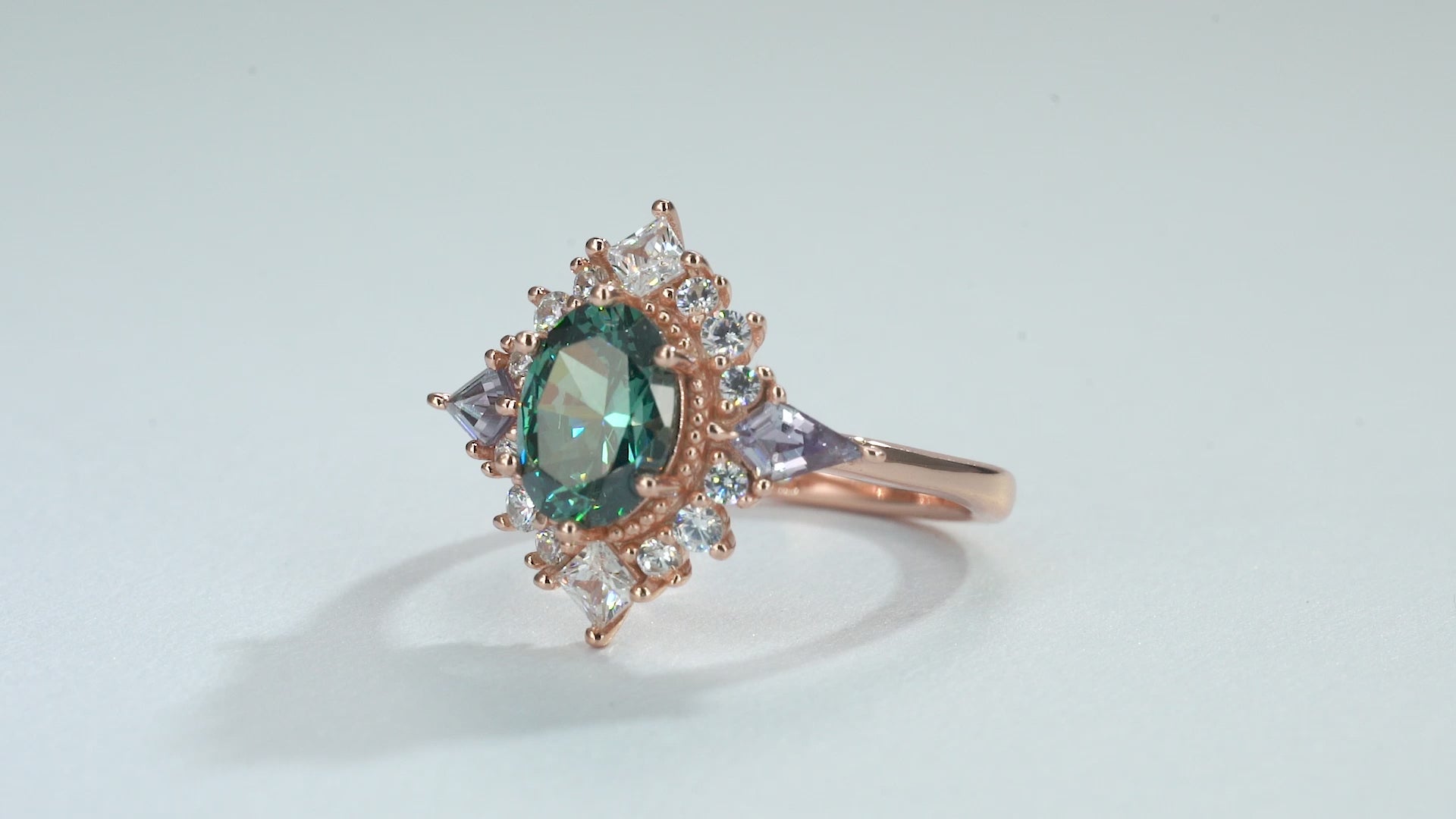 Rose gold sapphire ring with teal sapphire and amethyst